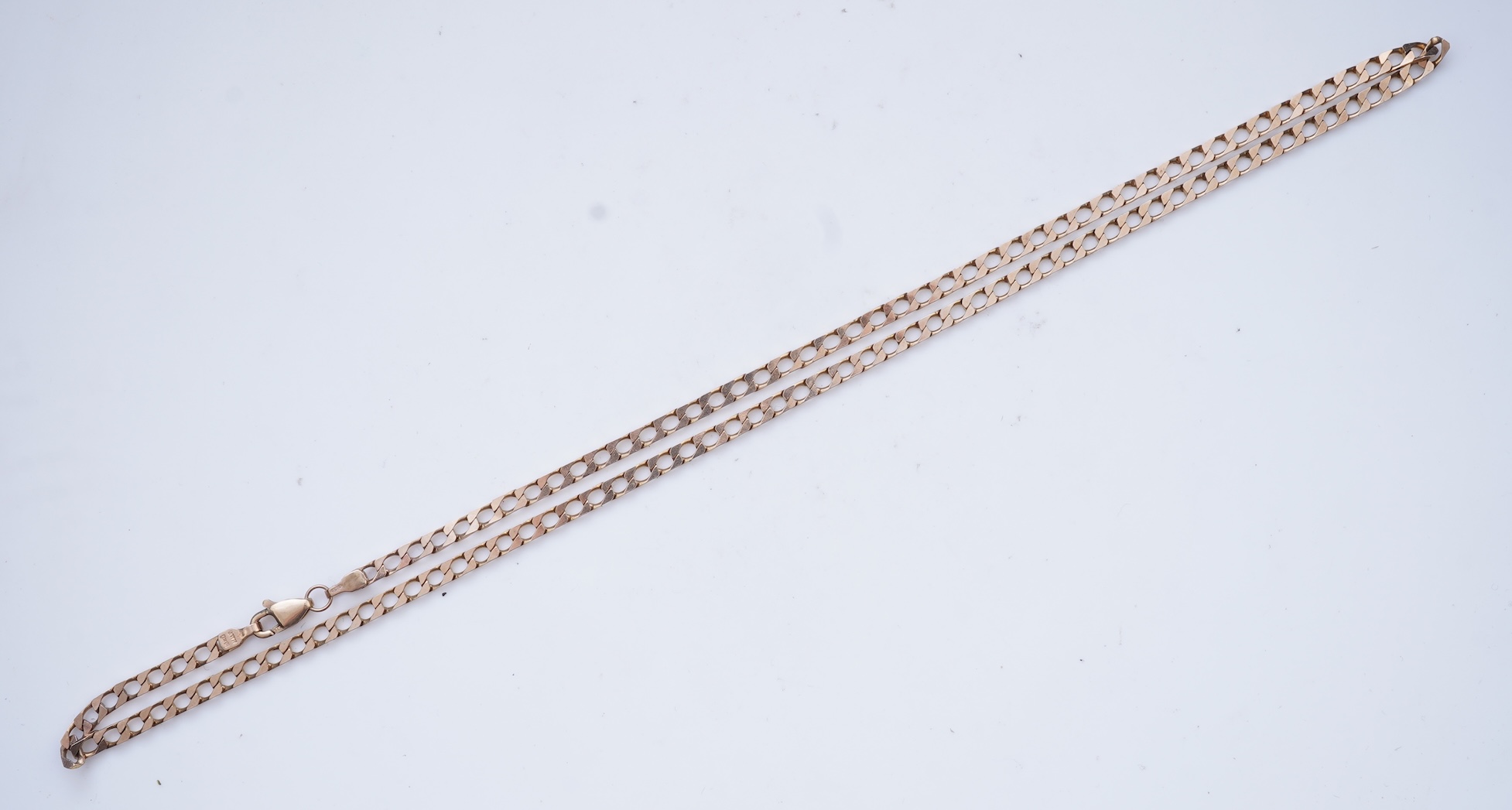 Three gold necklaces